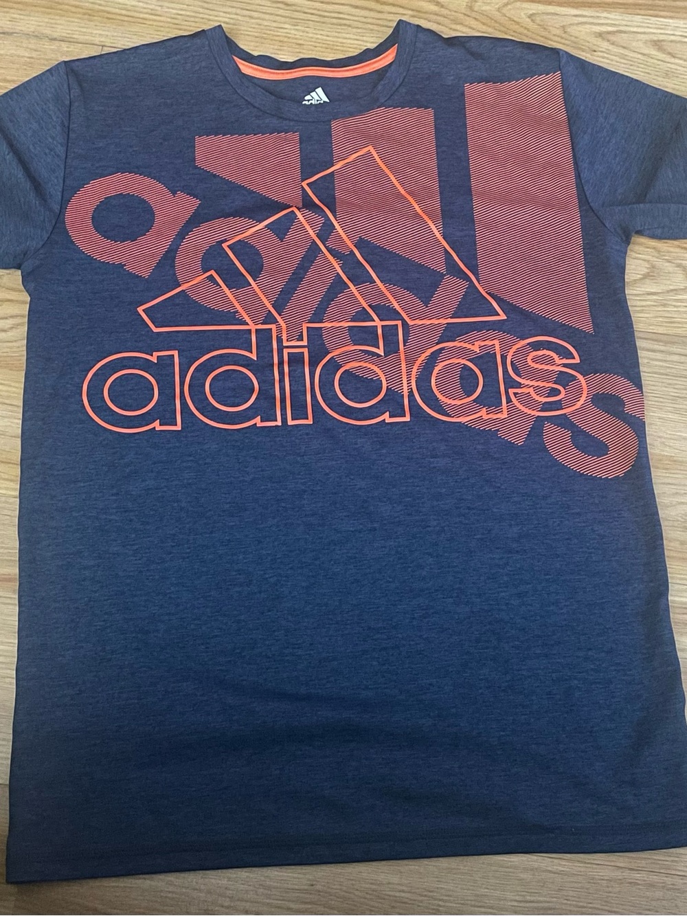Adidas Boys Size Large 14/16 Navy Blue Graphic Logo Tee with Orange Accents